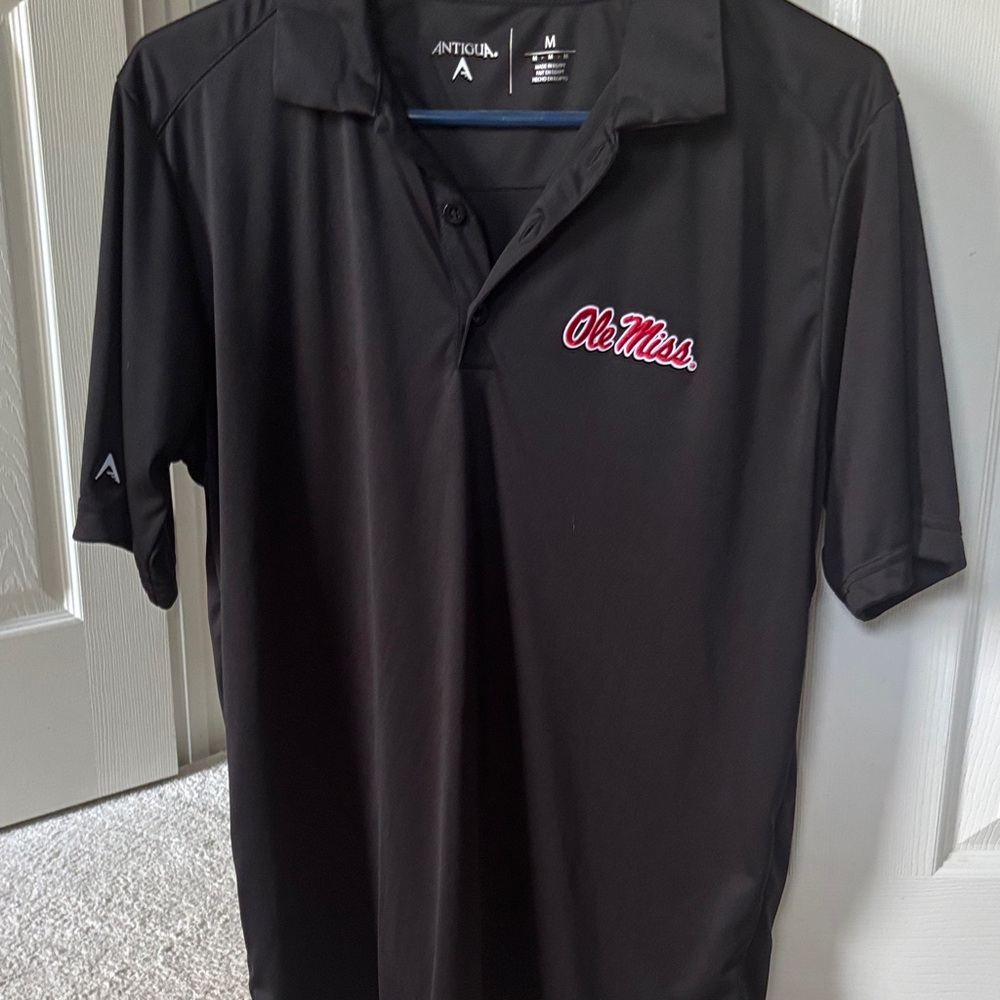 Ole Miss black performance polo 
Medium
